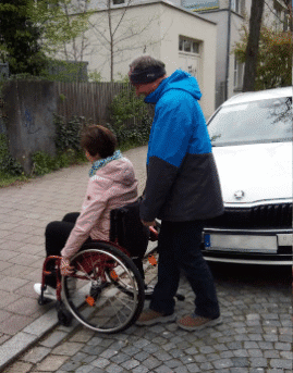 Wheelchair-user-with-accompaniment-when-changing-perspective