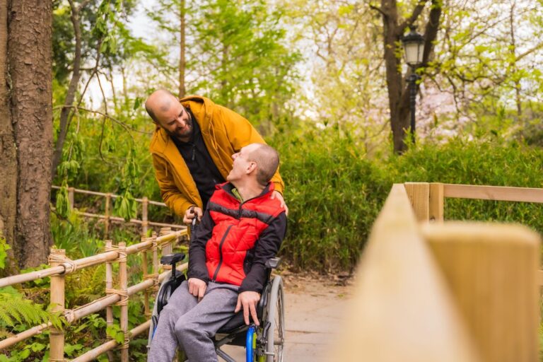 wheelchair-user-with-personal-assistant-in-the-park